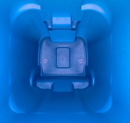 Same blue bin after cleaning and sanitizing